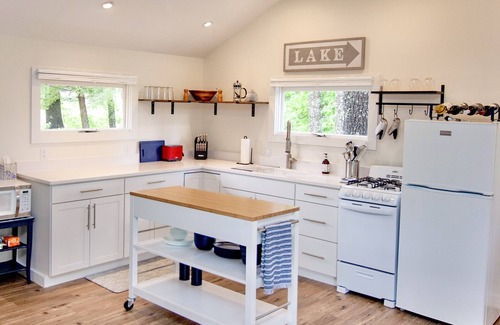 Alton Bay Cottage | Charming cottage with beach access, a grill, dock, & nearby golf