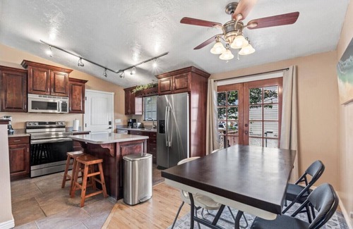 Millcreek Maison | Charming Mountain Retreat with Enclosed Backyard and Artistic Flair