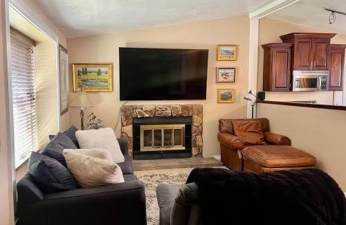 Millcreek Maison | Charming Mountain Retreat with Enclosed Backyard and Artistic Flair