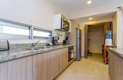 Zama Appartement | Charming Nature-Inspired Condos with Sultry Surroundings by Stella Rentals