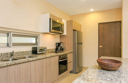 Zama Appartement | Charming Nature-Inspired Condos with Sultry Surroundings by Stella Rentals