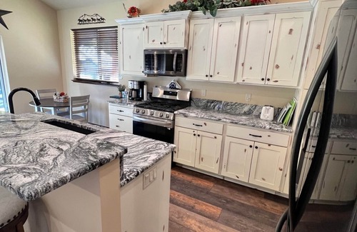 Pine Maison | Charming newer 2-bedroom house with WiFi, Dish TV in Pine with wrap around deck.