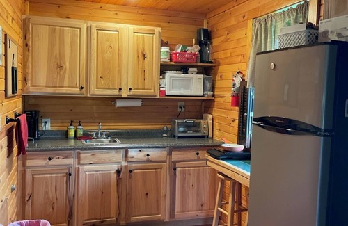 McClellandtown Cottage | Charming Rustic Cottage in the Heart of Laurel Highlands, PA Escape to this cozy, rustic retreat nestled in the stunning Laurel Highlands of Pennsylvania & Deer Creek Winery, where nature meets comfort & taste. Perfect for a weekend getaway or