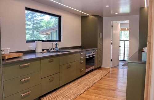 Hailey Maison | Charming Scandinavian Modern Riverfront Fishhouse