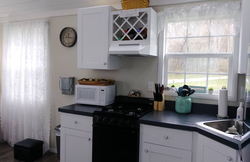 Cherry Creek Cottage | Charming Tiny Cottage in Serene Garden Setting – Perfect Country Getaway!