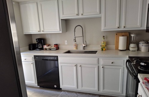 Carriage Manor Maison | Charming townhome with 2 bedrooms and 2 baths in a gated 55+ community.
