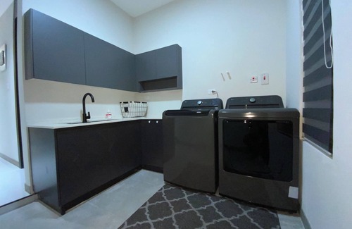 Priory Maison | Chic 2-Bedroom Luxury Home with Modern Amenities, Private Bath & Full Kitchen