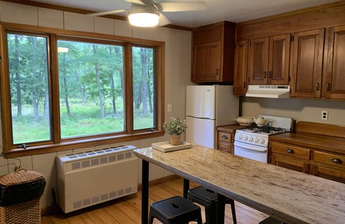 Montague Cottage | Chic farm cottage nestled in 52 private acres