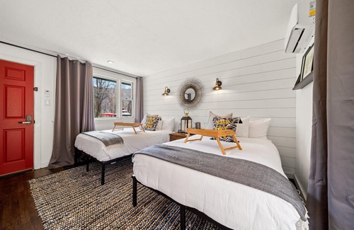 Hancock Hôtel | Chic Modern Farmhouse Retreat Featuring a Peaceful Garden Gazebo and Fire Pit View