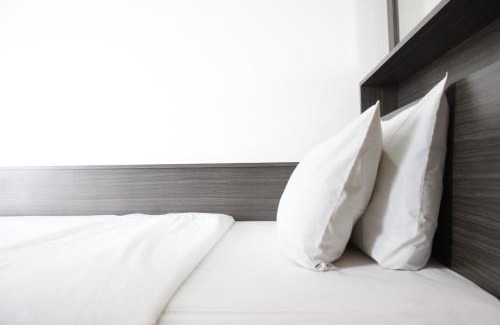 Cileunyi Appartement | Chic Studio Apartment at Harvard Jatinangor By Travelio