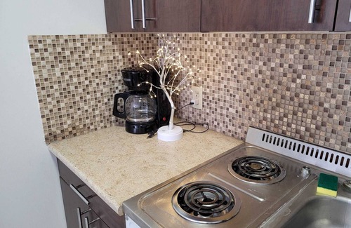 Eau Claire Appartement | Chic Studio Escape in Downtown Calgary