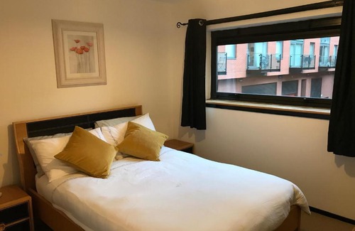 City Centre Glasgow Appartement | City Centre Riverside Apartment with private parking