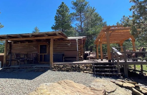 Gulnare Maison | CJs Ranch RV and Tent spots with Log Cabin