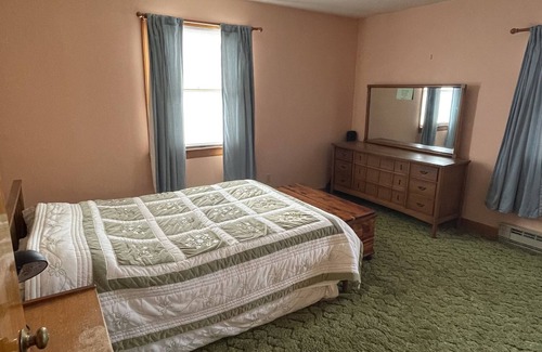 Mustoe Maison | Classic cozy brick ranch, with beautiful panoramic views!
