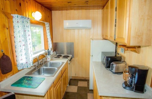 Puposky Cabine | Classic Minnesota Lakefront Cabin - Private Beach & Resort Amenities