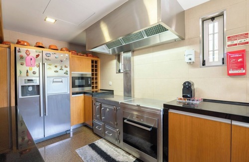 Paredes Maison | Classic Villa w/ Gym and Pool Access by HostWise