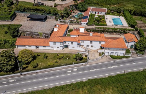 Paredes Maison | Classic Villa w/ Gym and Pool Access by HostWise