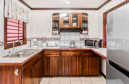 Damas Copropriété | Clean & Bright Getaway W/ Shared Pool, Lush Gardens, & Ideal Location Near Town!
