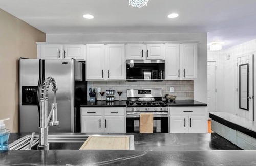 Blasdell Maison | Clean,Cozy &Updated Home with Jacuzzi, Fenced in yard, BarShed, Firepit & MORE!
