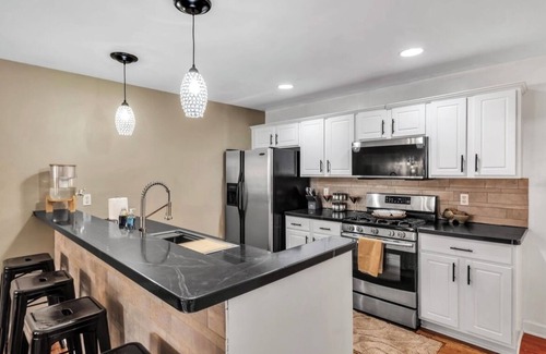 Blasdell Maison | Clean,Cozy &Updated Home with Jacuzzi, Fenced in yard, BarShed, Firepit & MORE!