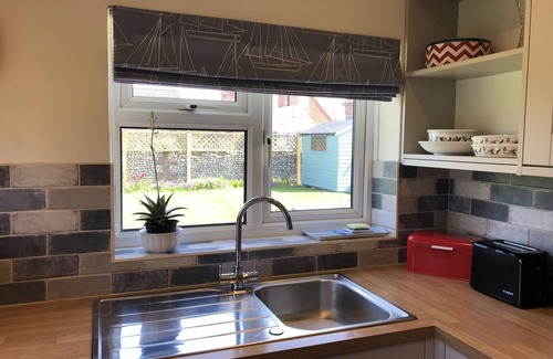 Holt Maison | Maison de vacances récemment rénovée avec un grand jardin sécurisé - un joyau caché.