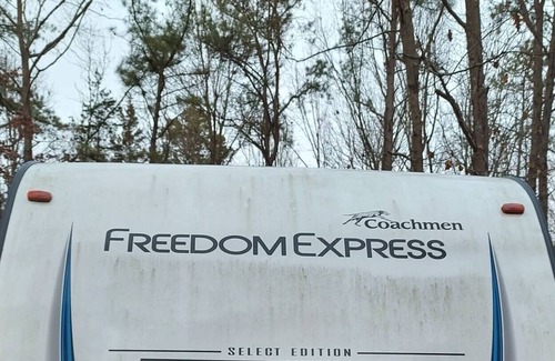 Clayton Maison | Coachman Freedom Express at the Cabin in the woods
