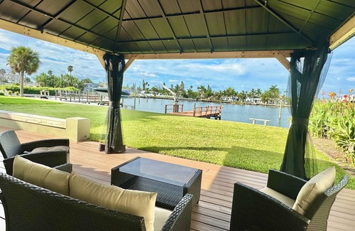 Madeira Beach Maison | Coastal Charm, Waterfront 3BR Home with Dock & Walk-to-Beach Access