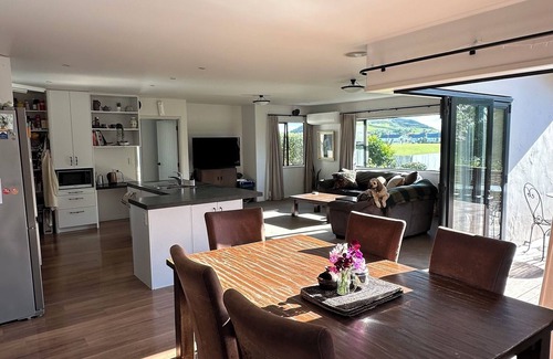 Papamoa Beach Maison | Coastal family home, 5 minutes walk to beach, hot tub, fully accessible