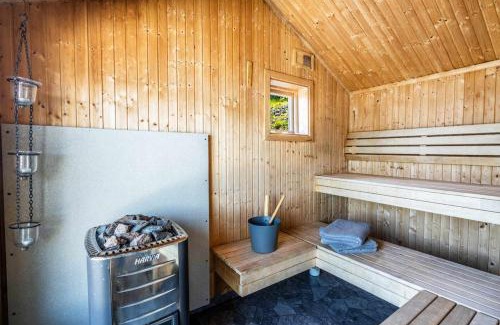 Bjasta Maison | Coastal gem with beach, wooden sauna & canoes