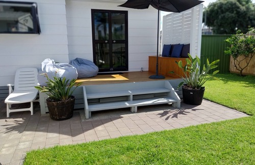 Papamoa Beach Cottage | Coastal holiday home with Hot Tub, newly renovated and very close to the beach