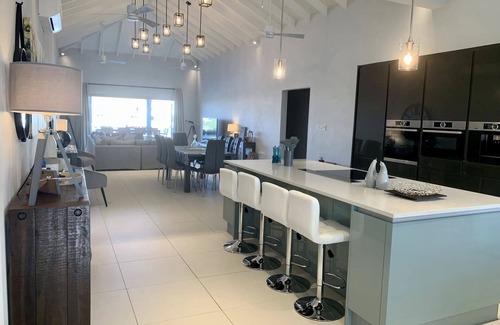 Jolly Harbour Villa | Coco Palms has spectacular panoramic sea and sunset views.