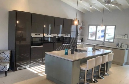 Jolly Harbour Villa | Coco Palms has spectacular panoramic sea and sunset views.