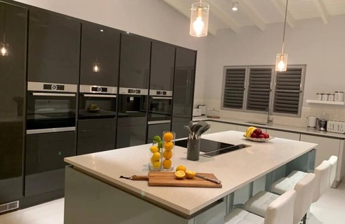 Jolly Harbour Villa | Coco Palms has spectacular panoramic sea and sunset views.