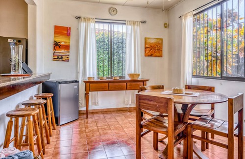 Barrio Ricos y Famosos Maison | Colorful, dog-friendly home with private pool, W/D, & lush setting