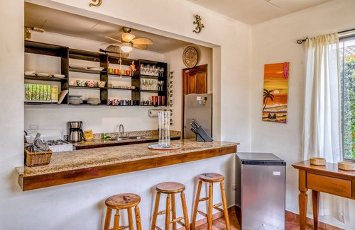 Barrio Ricos y Famosos Maison | Colorful, dog-friendly home with private pool, W/D, & lush setting