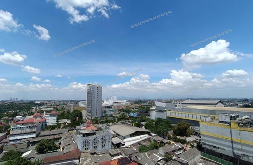 Pondokcina Appartement | Comfortable Studio with City View Balcony - Mahata Margonda