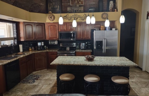 Maricopa Maison | Comfortable and beautiful golf course home with inviting/accessorized backyard.