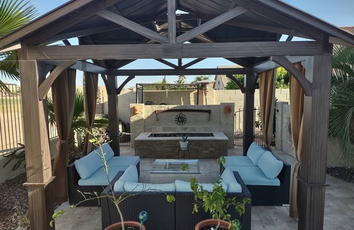 Maricopa Maison | Comfortable and beautiful golf course home with inviting/accessorized backyard.