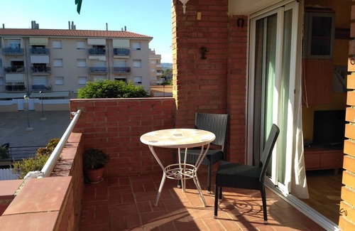 Comarruga Appartement | Appartement confortable, Wi-Fi A / C et piscine.