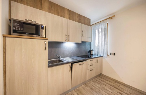 Predazzo Appartement | Appartement confortable "Vacanze Arcobaleno - Rosso" avec vue sur la montagne
