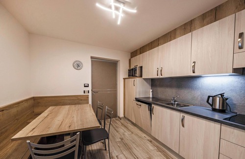 Predazzo Appartement | Appartement confortable "Vacanze Arcobaleno - Azzurro" avec vue sur les montagnes