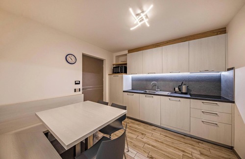 Predazzo Appartement | Appartement confortable "Vacanze Arcobaleno - Blu" avec vue montagne