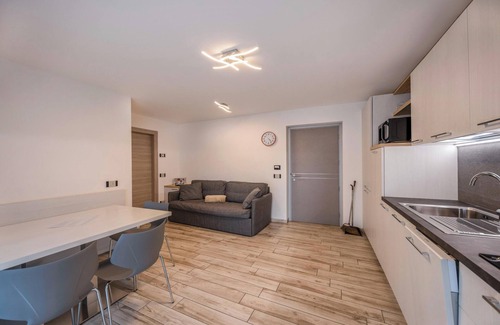 Predazzo Appartement | Appartement confortable "Vacanze Arcobaleno - Arancione" avec vue sur les montagnes