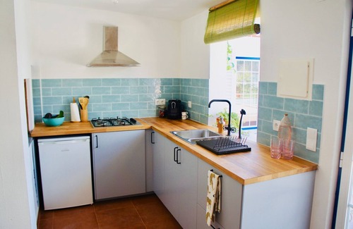 Assafora Appartement | Comfortable, Ground Floor Apartment with Garden View