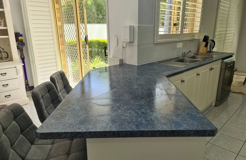 Nudgee Maison | Comfortable pet friendly family home, 12 min to BNE terminals, 5 to Nudgee Beach