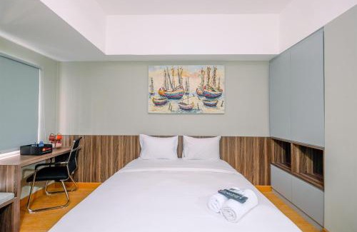 Duren Sawit Appartement | Comfortable Pool View Studio Room at Gateway Park LRT City Jatibening Apartment By Travelio