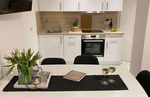 Lietzow Appartement | Comfortable vacation apartment with balcony, sauna and Bodden view