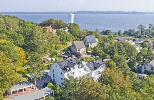 Lietzow Appartement | Comfortable vacation apartment with balcony, sauna and Bodden view