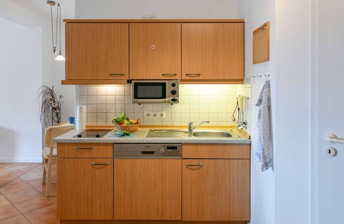 Neuensien Appartement | Comfortable vacation apartment with lake view and conservatory in the Seedorf vacation park