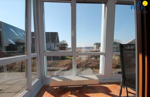 Neuensien Appartement | Comfortable vacation apartment with lake view and conservatory in the Seedorf vacation park